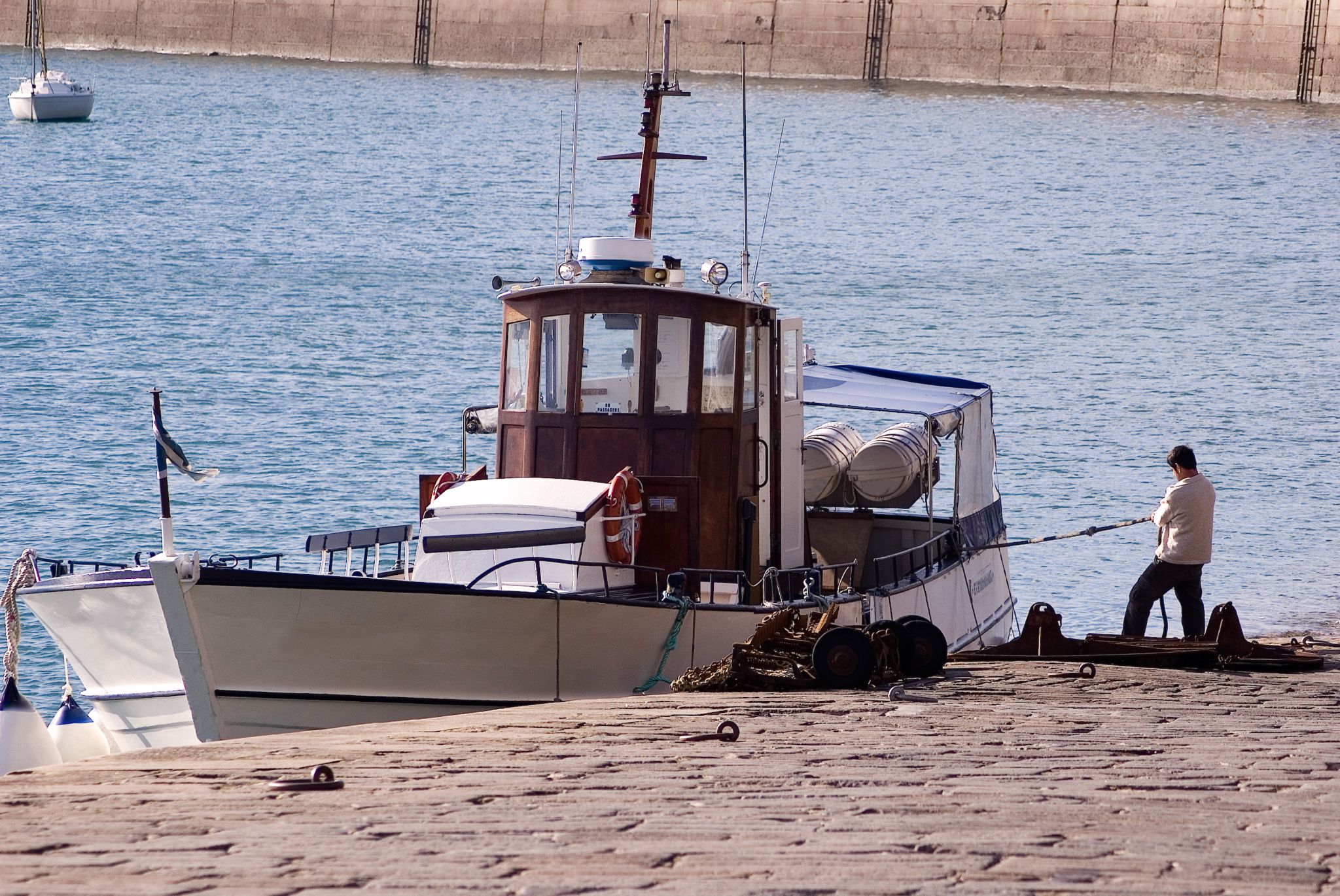 manœuvres d’accostage au quai d’un port